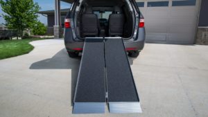 Suitcase portable wheelchair accessibility ramp