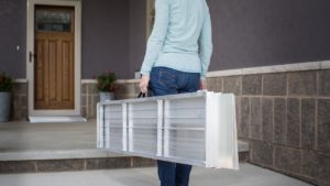 Suitcase portable wheelchair accessibility ramp