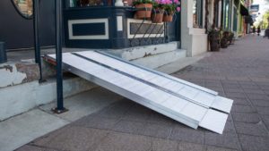 Suitcase portable wheelchair accessibility ramp